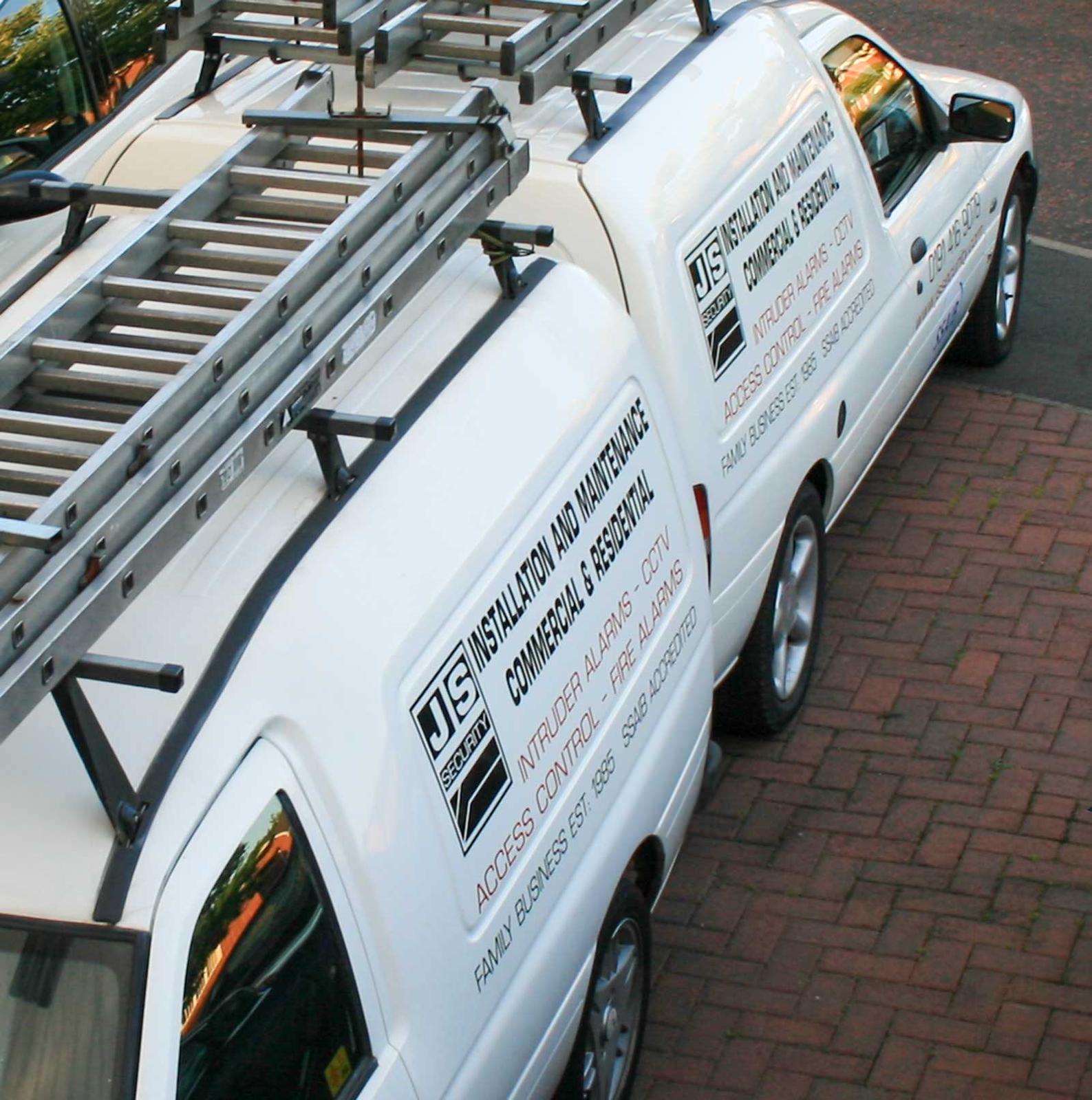The original JS Security family-business vans — North 85's roots, a North East family business established 1985